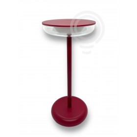 Rechargeable battery-operated table lamp in metal and red painted Abs for indoor/outdoor use